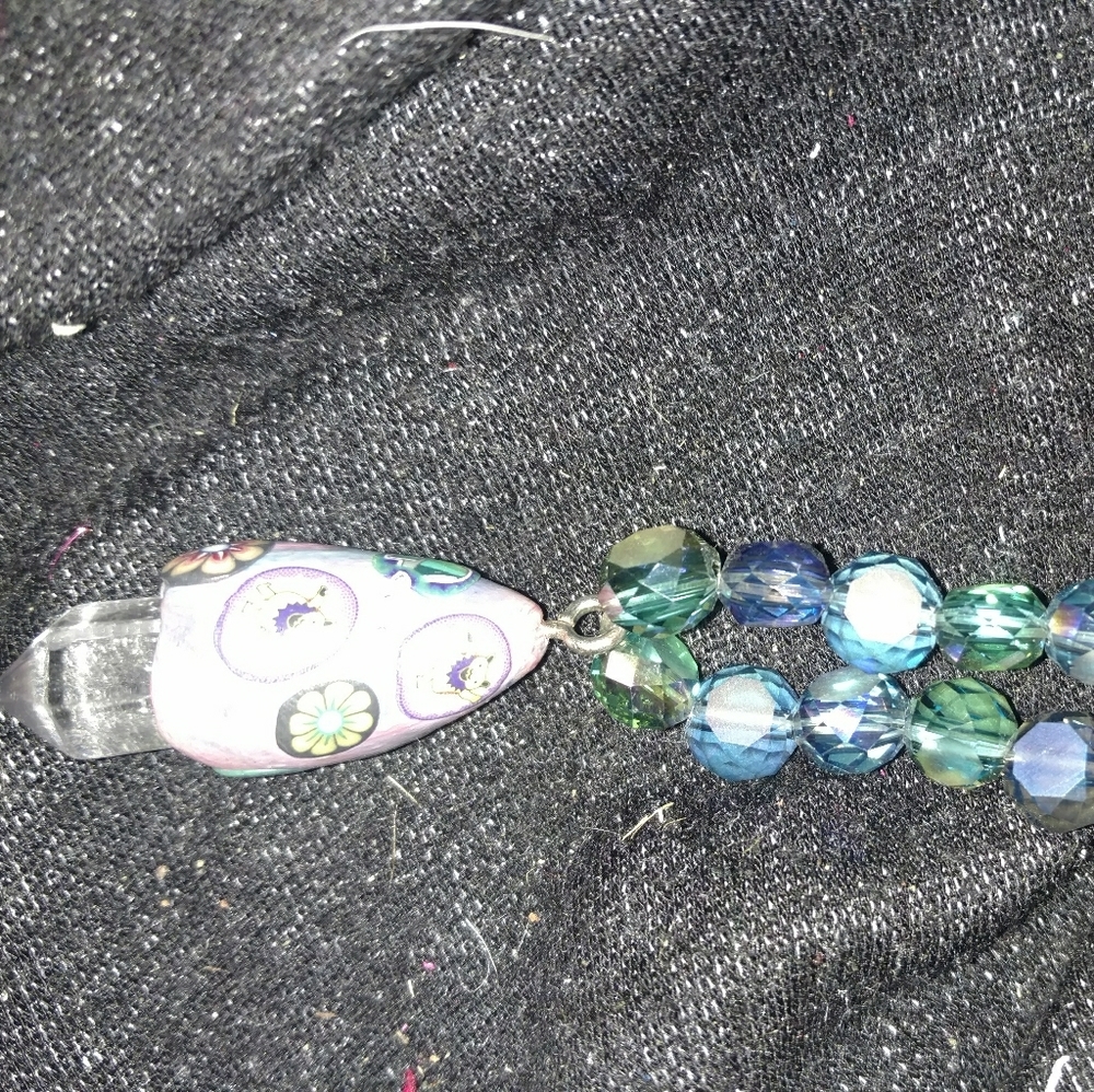 Crystal necklace with paulmore Clay center crystal